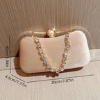 Amblot Rectangular corduroy purse with shiny handle