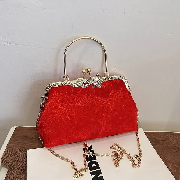 Amblot Red Corduroy evening clutch bag with wrist strap