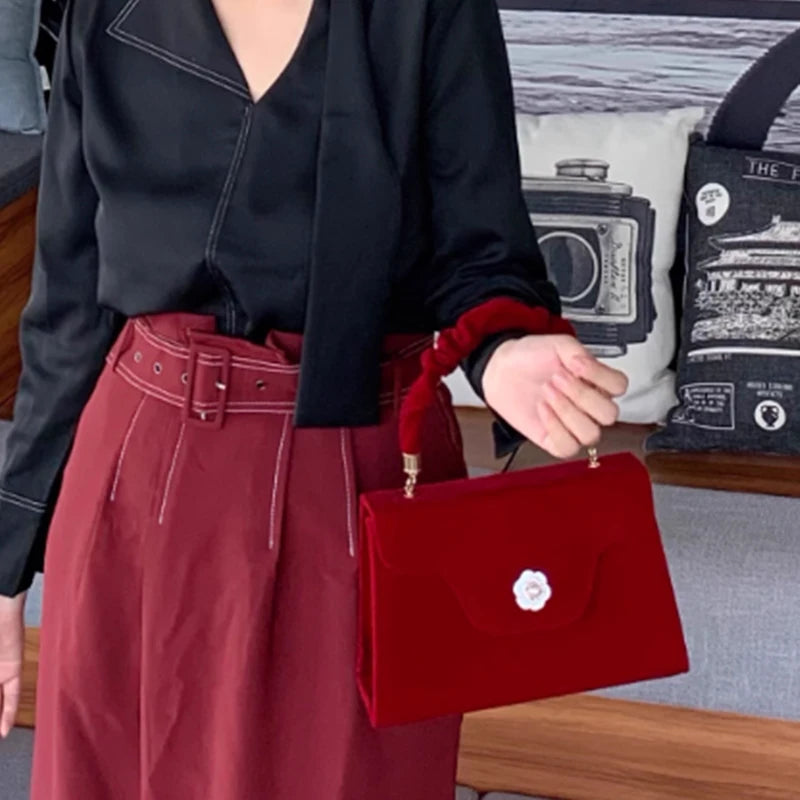 Amblot Red corduroy evening purse