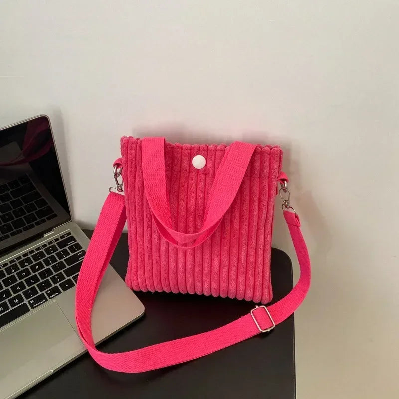 Amblot Red Corduroy handbag with front button detail