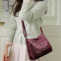 Amblot Red Leather shoulder bag with adjustable strap
