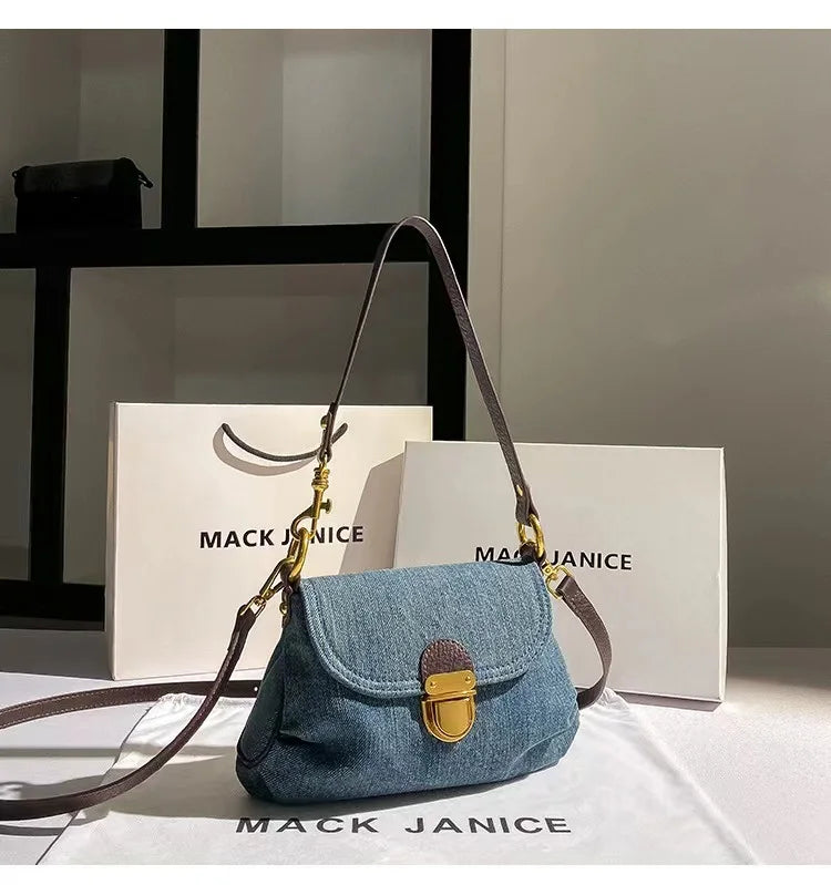 Amblot Retro denim clutch bag with gold buckle closure