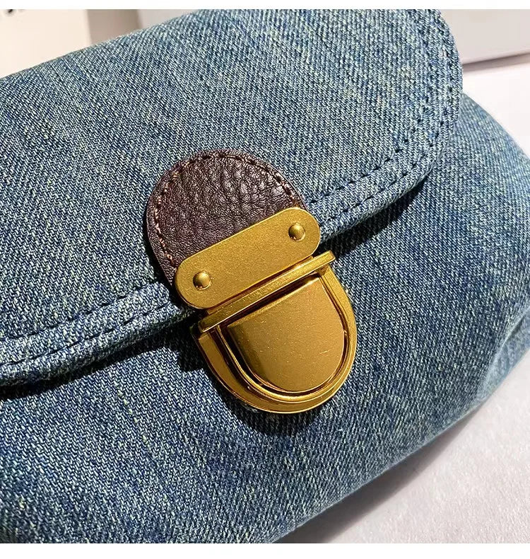Amblot Retro denim clutch bag with gold buckle closure