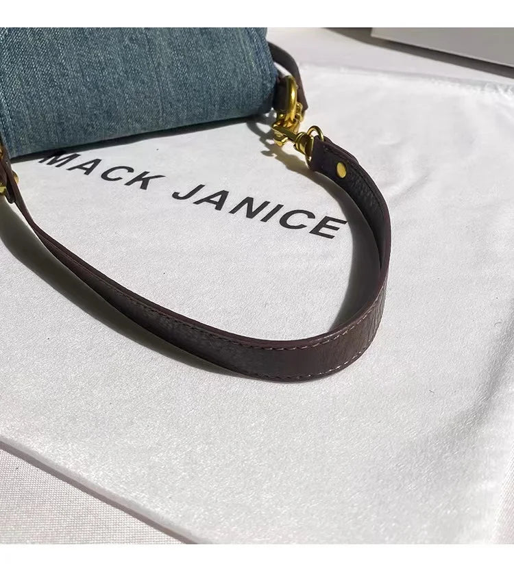Amblot Retro denim clutch bag with gold buckle closure