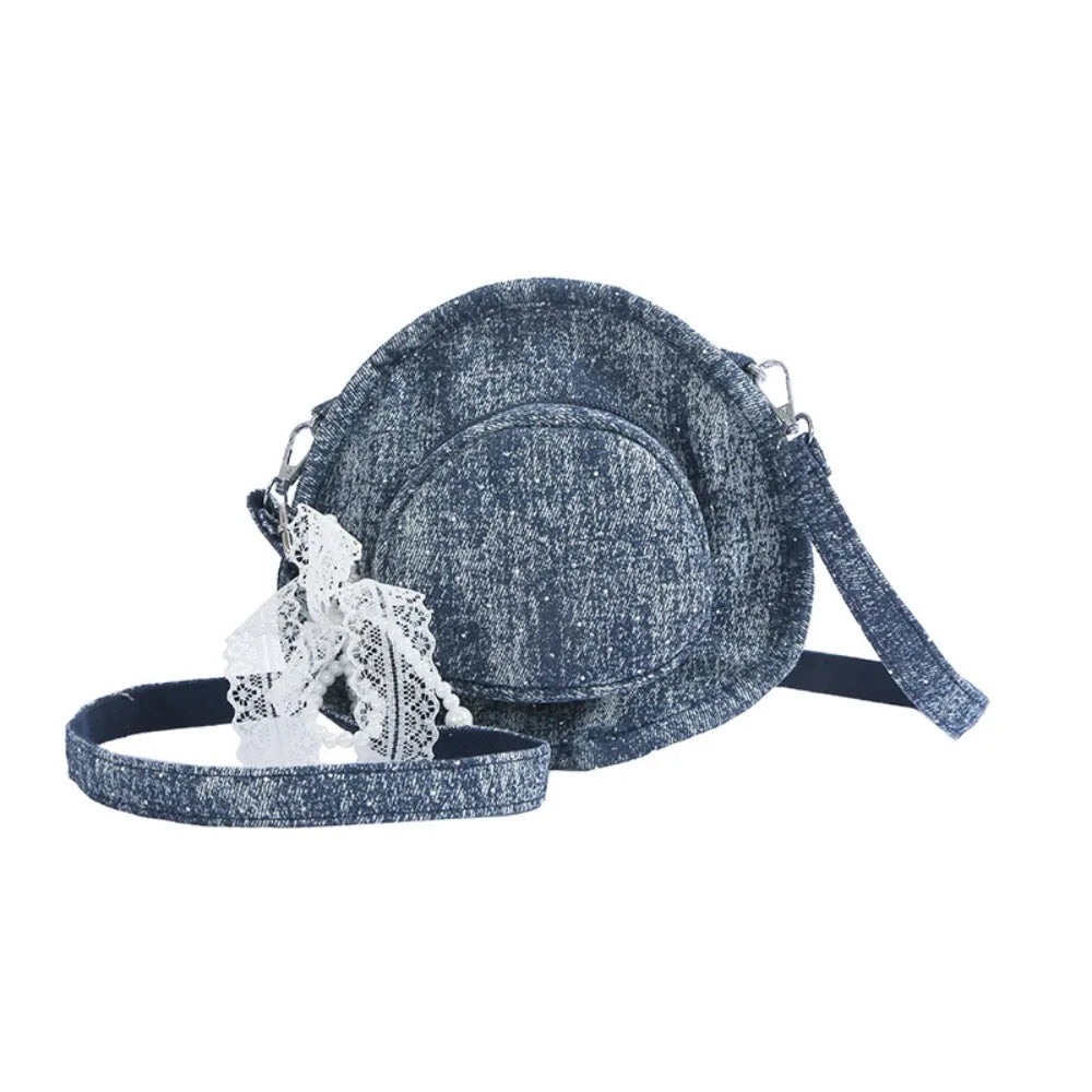 Amblot Round denim crossbody bag with fringe and zip closure