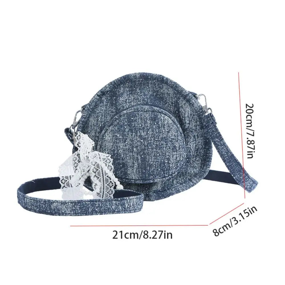 Amblot Round denim crossbody bag with fringe and zip closure