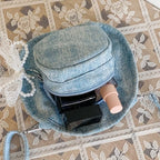 Amblot Round denim crossbody bag with fringe and zip closure