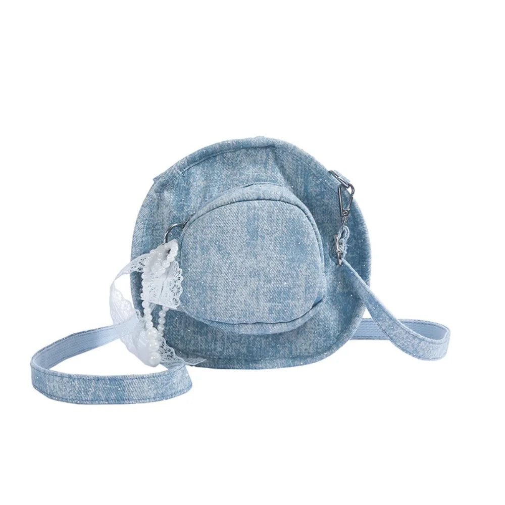 Amblot Round denim crossbody bag with fringe and zip closure