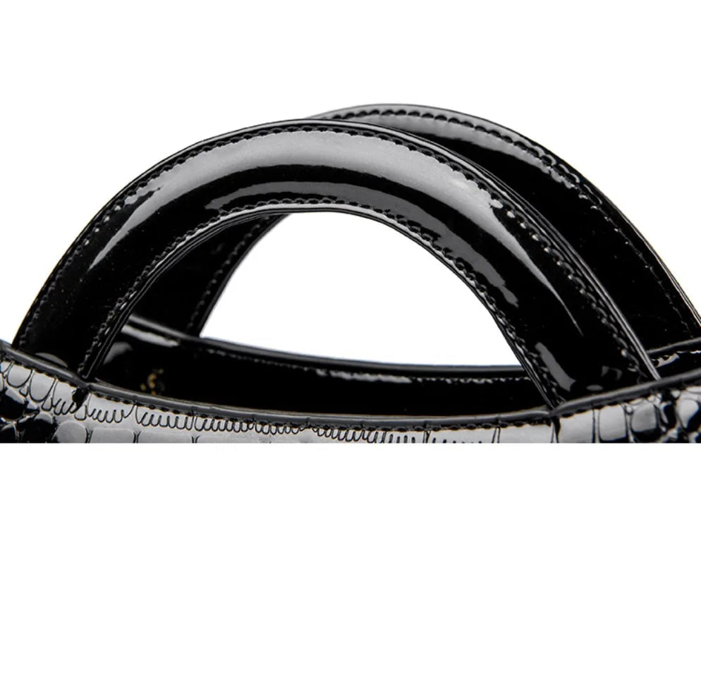 Amblot Soft leather handbag with curved top edge