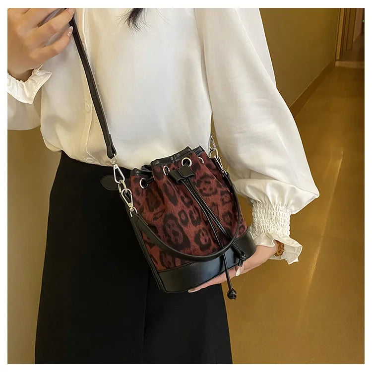 Amblot Structured corduroy clutch bag
