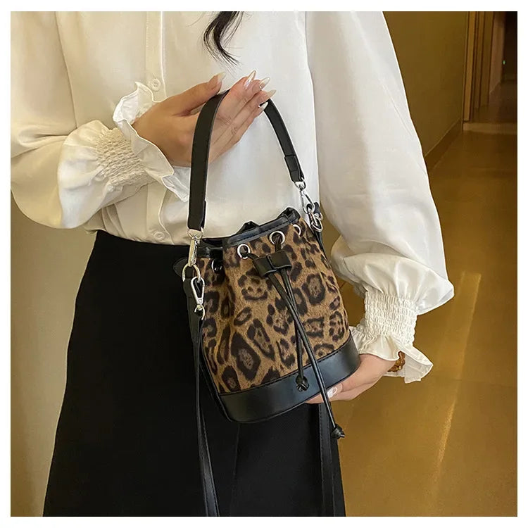 Amblot Structured corduroy clutch bag
