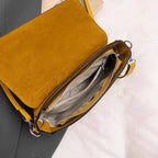 Amblot Structured suede handbag with minimalist shape