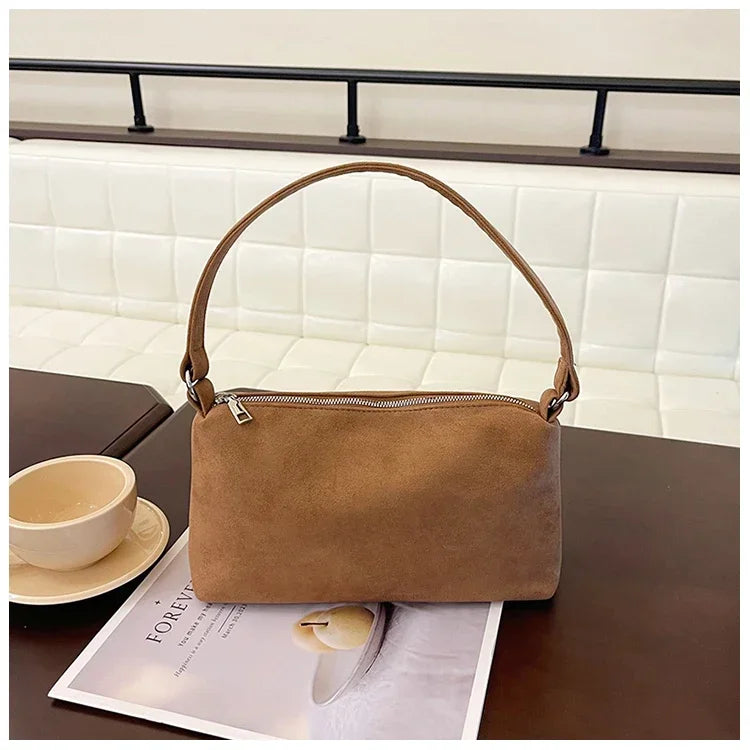 Amblot Structured suede shoulder bag