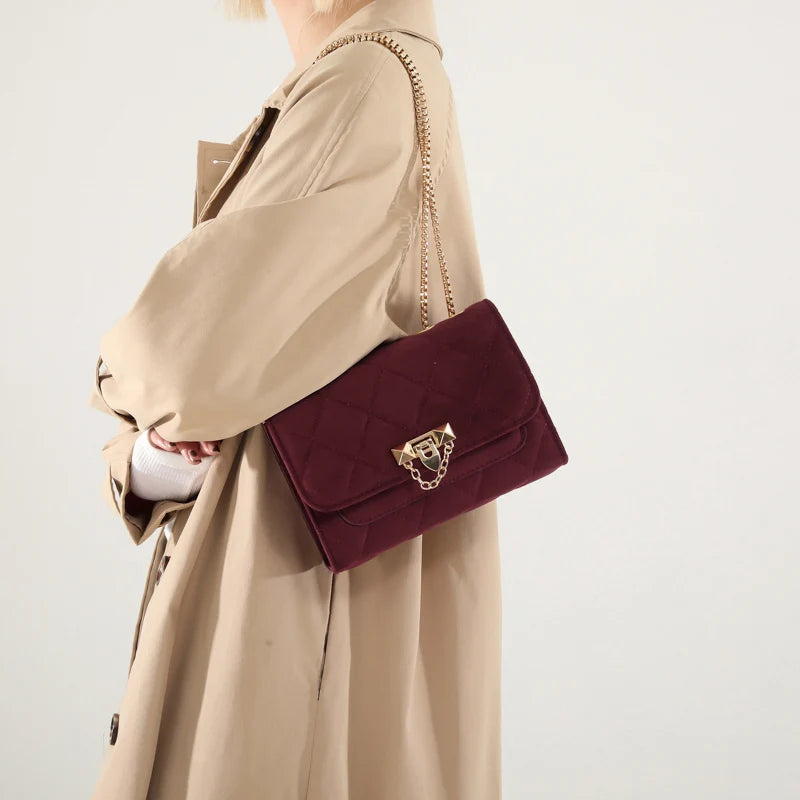 Amblot Suede crossbody purse with chain strap