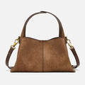 Amblot Suede handbag with rounded handles and zip closure