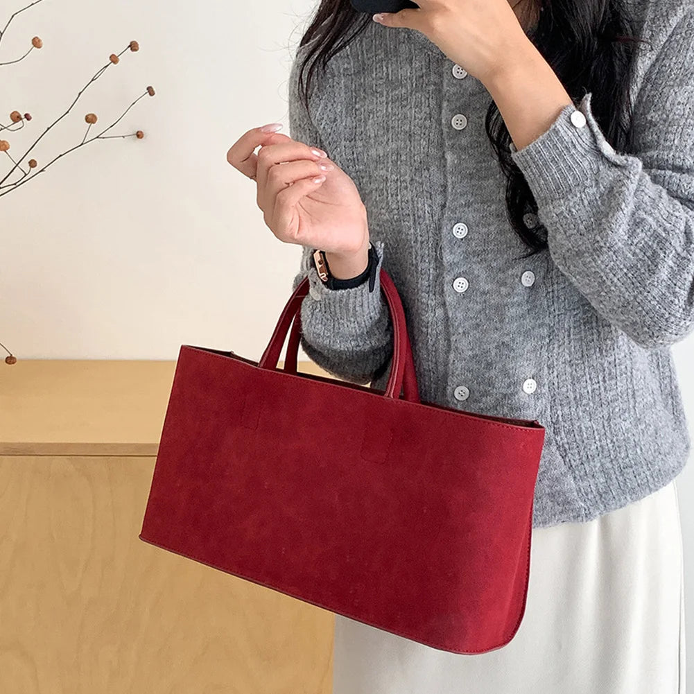 Amblot Suede tote bag with structured silhouette