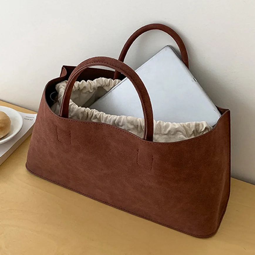 Amblot Suede tote bag with structured silhouette