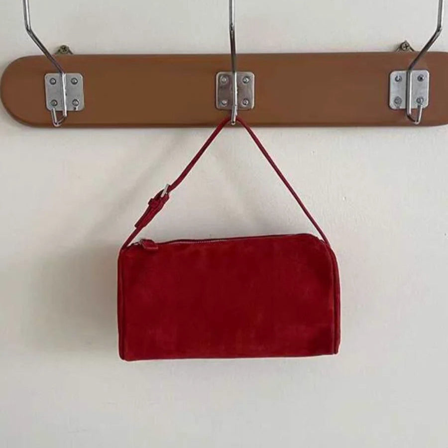 Amblot Vintage-style suede purse