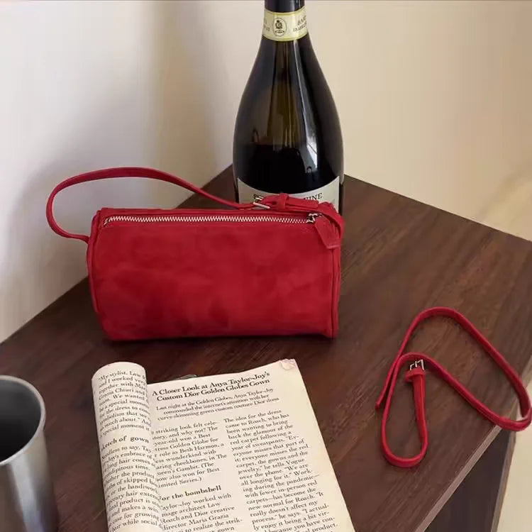 Amblot Vintage-style suede purse