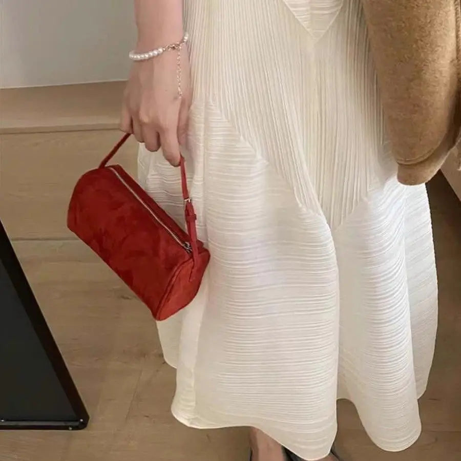 Amblot Vintage-style suede purse