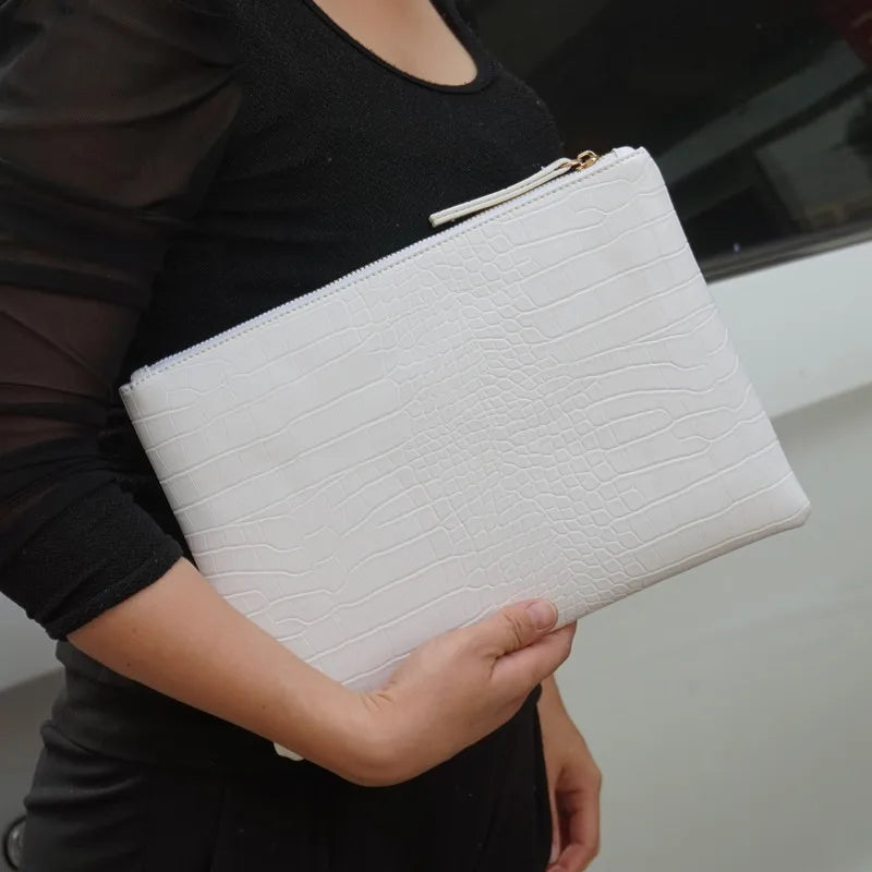 Amblot White Textured leather clutch