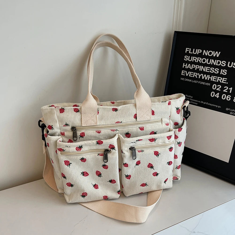 Amblot White Women’s strawberry print corduroy tote bag