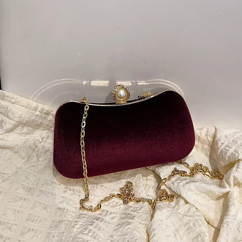 Amblot Wine Red Corduroy clutch bag with  chain strap