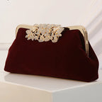 Amblot Wine Red Corduroy clutch bag with decorative closure