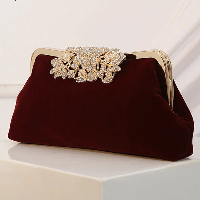 Amblot Wine Red Corduroy clutch bag with decorative closure