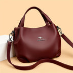 Amblot Wine Red Leather handbag with wide base