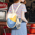 Amblot Women’s blue and white convertible bag