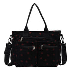 Amblot Women’s strawberry print corduroy tote bag