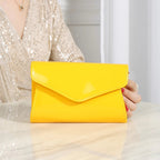 Amblot Yellow Minimal leather handbag with slim profile