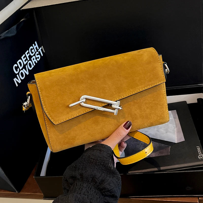 Amblot Yellow Structured suede handbag with minimalist shape